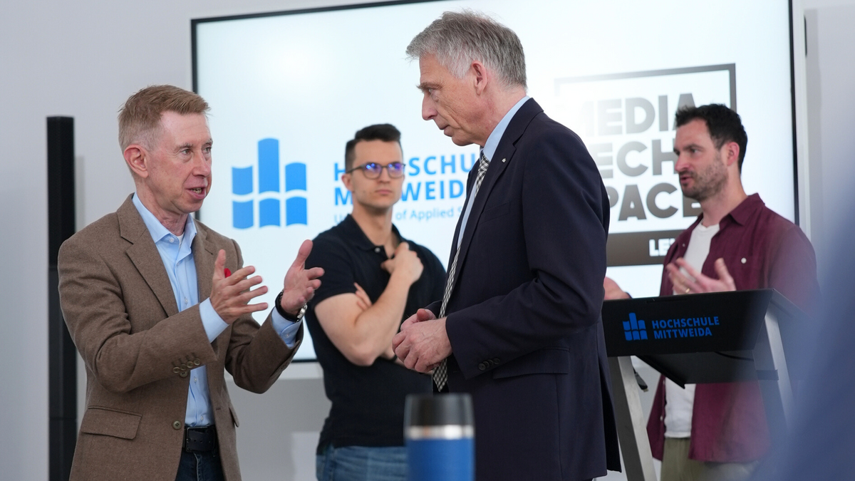 Herren im Gespräch nach Vorträgen: Tilo Fiebig, Volker Tolkmitt